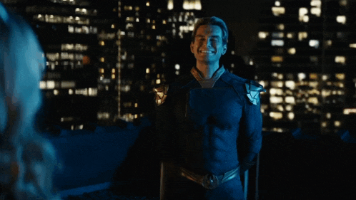 a man in a superhero costume shakes hands with a woman and says " stop it "