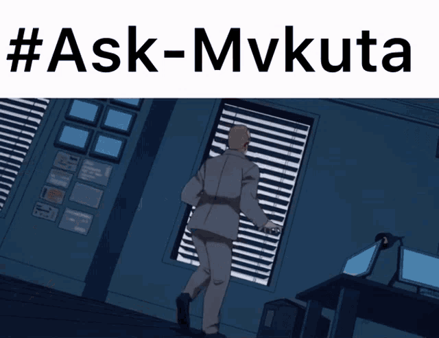 a man in a suit is walking through a dark room with the hashtag # ask-mvkuta