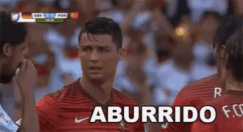 a soccer player wearing a nike jersey is talking to another player on the field .