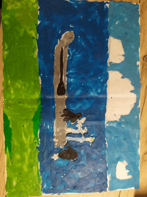 a child 's painting of a body of water with a green and blue border
