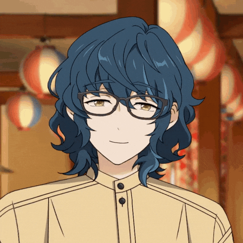 a man with blue hair and glasses is smiling