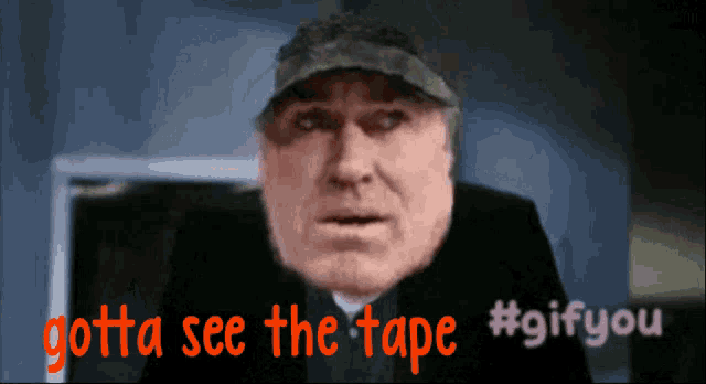a gif of a man with the caption gotta see the tape