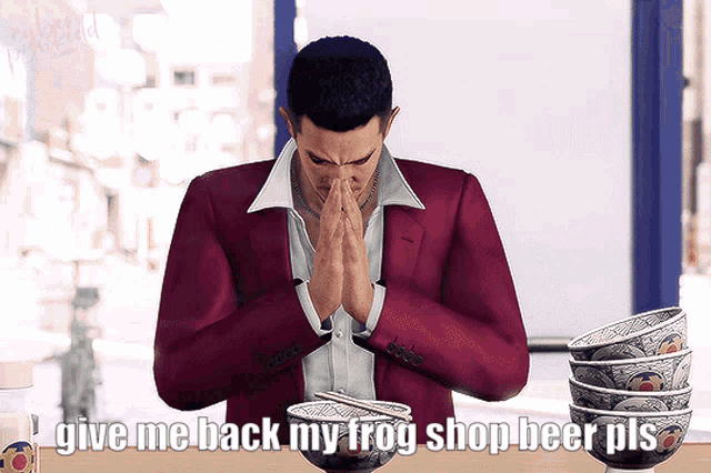 a man in a red suit is praying with a bowl of food in front of him