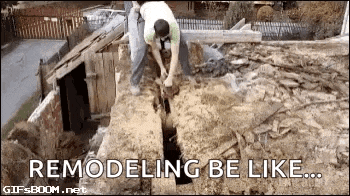 a man is digging a hole in the ground with a shovel in a dirt field .