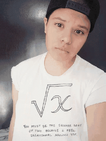 a person wearing a shirt that says " you must be the square root of two "