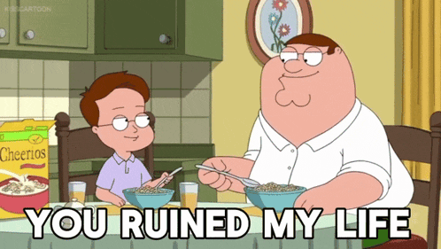 peter griffin is sitting at a table with a boy eating cheerios