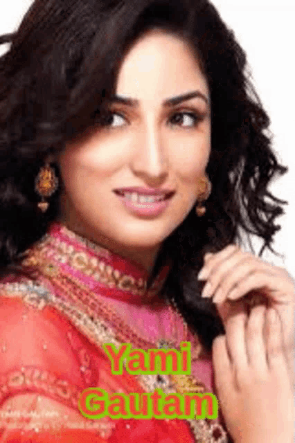 a close up of a woman 's face with the name yami gautam in green
