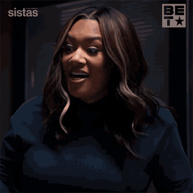 a woman says " they 're listening " in front of a be t logo