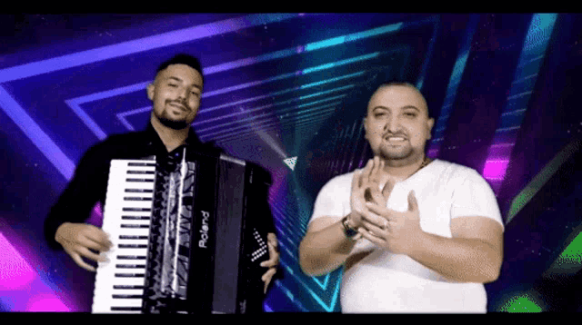 a man playing an accordion and another man playing a keyboard