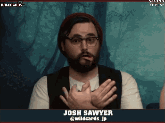 a man named josh sawyer is making a face