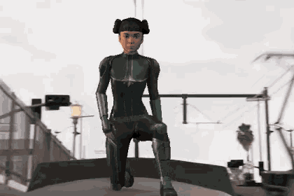 a woman in a green and black superhero suit is squatting down