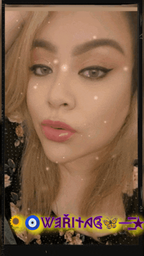 a woman 's face is displayed with the word owaritag written on it