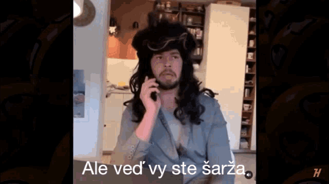 a man talking on a cell phone with the words ale ved vy ste sanza