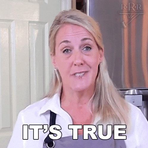 a woman says it 's true in front of a fridge