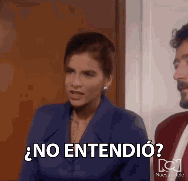a man and a woman are standing next to each other and the woman says no entendio