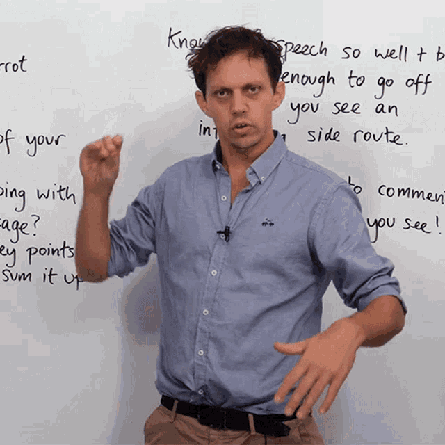 a man stands in front of a white board that says know speech so well to be enough to go off if you see an side route