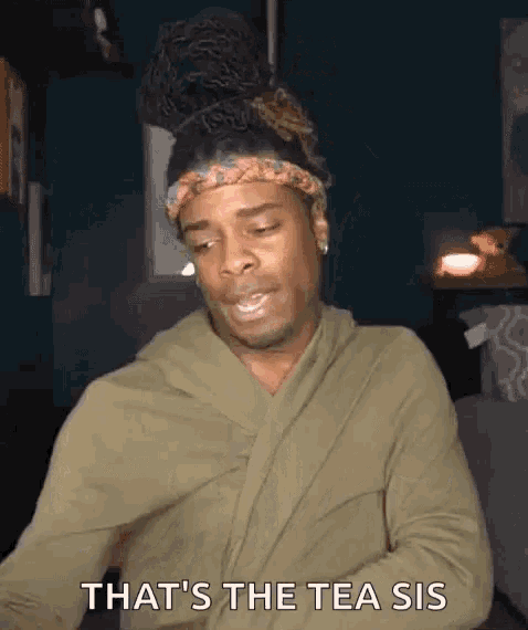 a man with dreadlocks is wearing a green robe and a headband and says that 's the tea sis .