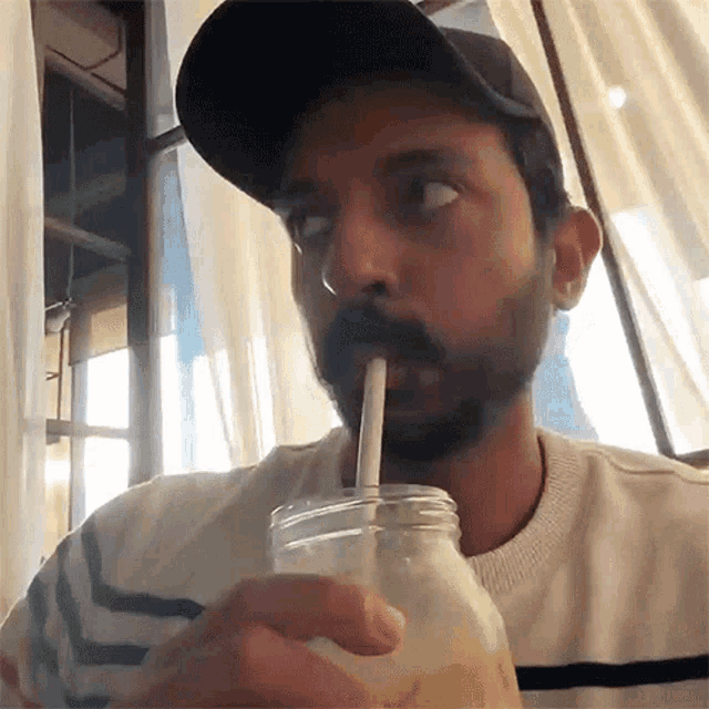 Sipping Faisal Khan GIF - Sipping Faisal Khan Drinking GIFs