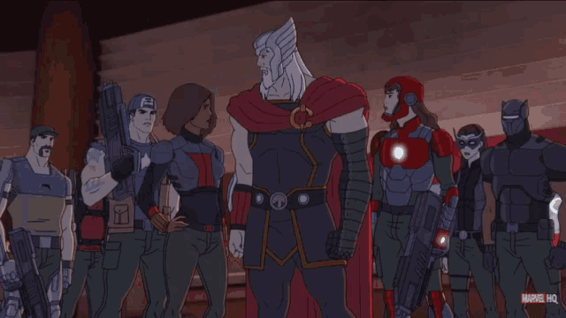 a group of marvel heroes are standing together