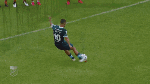 a blurred image of a soccer game with a lpt logo