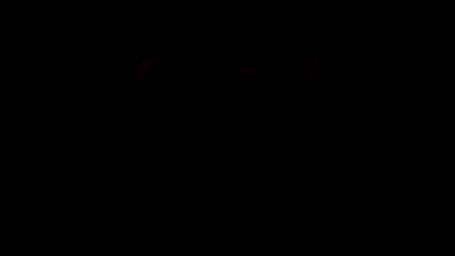 a red light is shining on a dark red background