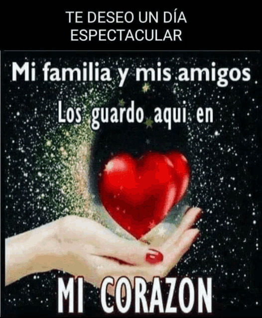 a woman is holding a red heart in her hand with the words " mi corazon " underneath it