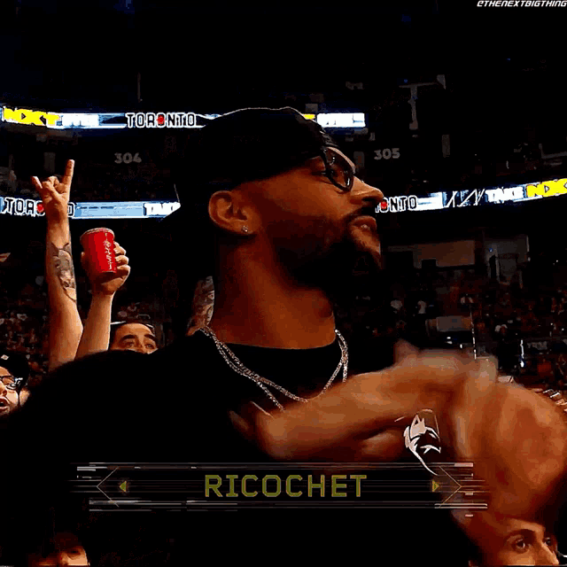 a man in a black hat with the word ricochet on it