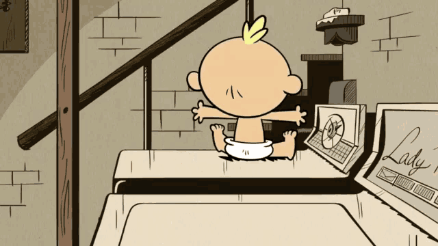 a baby in a diaper is sitting on a table next to a lady newspaper