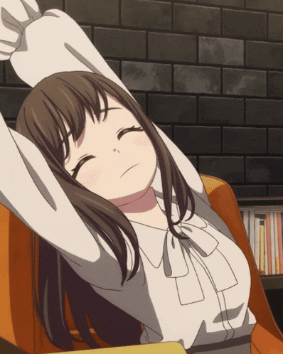 a girl with long brown hair is stretching her arms in front of a brick wall