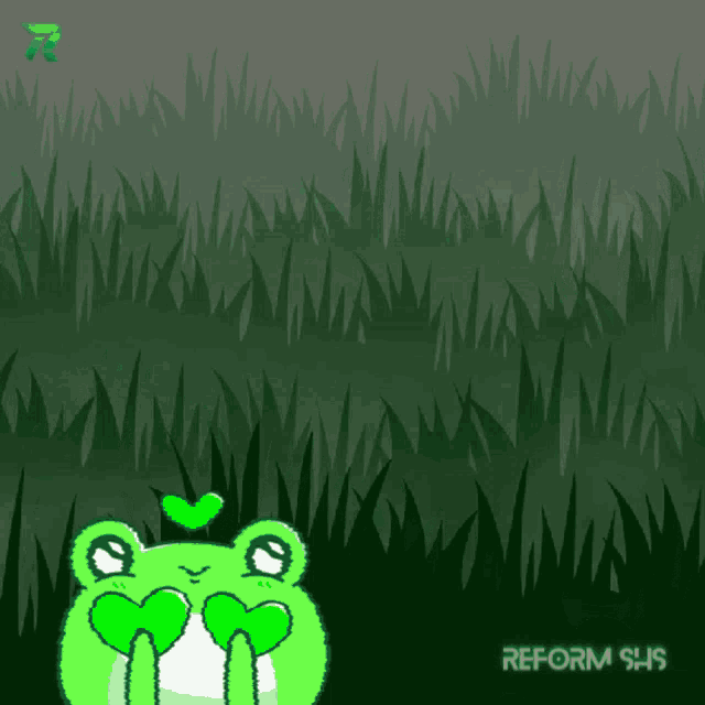 a green frog with hearts and the word love glowing in the grass