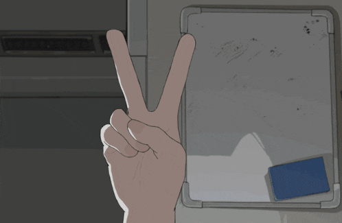 a girl laying in an ambulance with her arm in the air giving a peace sign