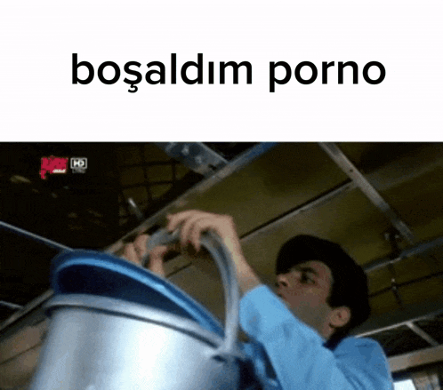 a man in a blue shirt is holding a bucket with the words bosaldm porno written above him