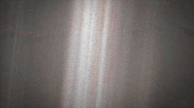 a gray background with a white stripe on the bottom