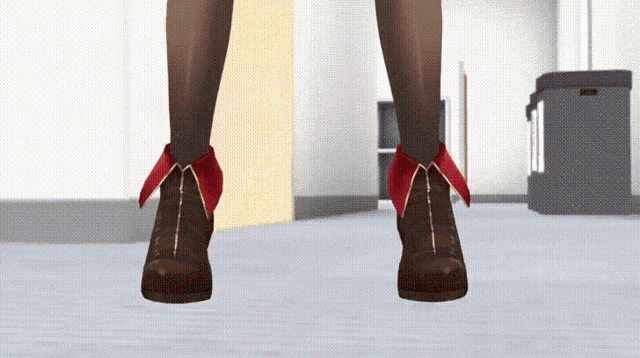 a woman wearing a pair of brown shoes with red ribbons on the ankles