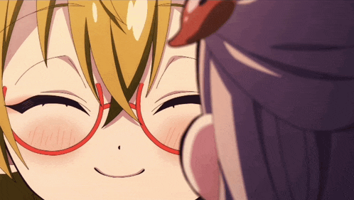 a close up of a person 's face with glasses