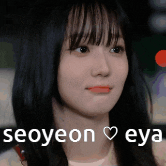 a close up of a woman 's face with the words seoyeon eya written on the bottom