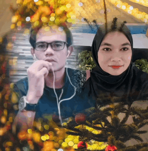 a man wearing glasses and headphones is next to a woman wearing a black hijab