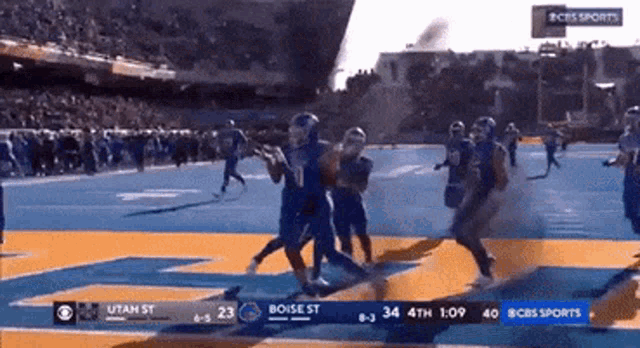 a football game is being played between utah and boise st.