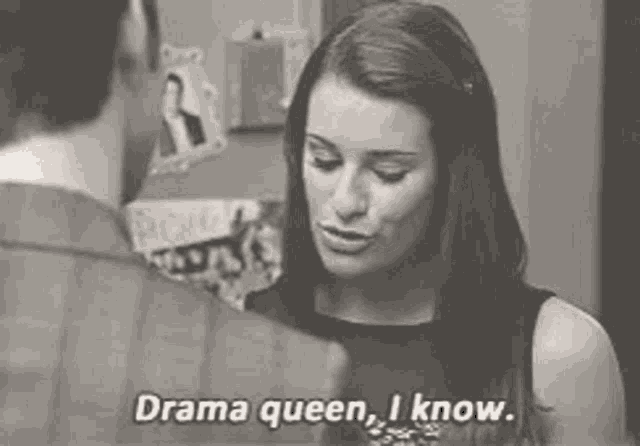 a woman is talking to a man and says " drama queen , i know " .