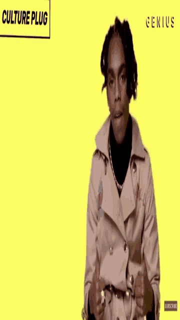 a man in a trench coat is on a yellow background with the words cultural plug genius on the bottom