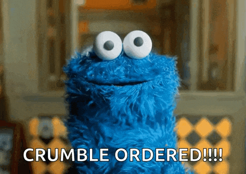 cookie monster from sesame street says " crumble ordered !!! "