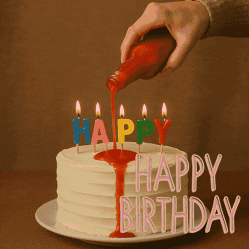 a birthday cake with candles that spell out happy birthday