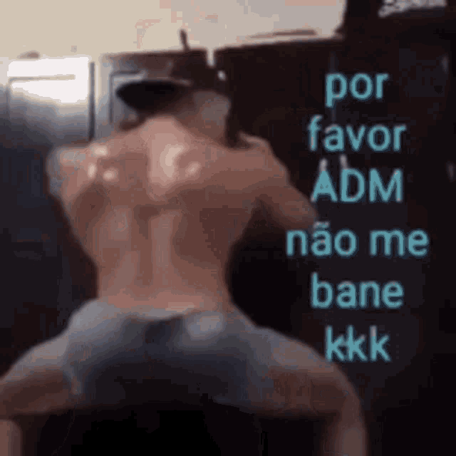 a shirtless man is standing in front of a sign that says por favor adm nao me bane kkk