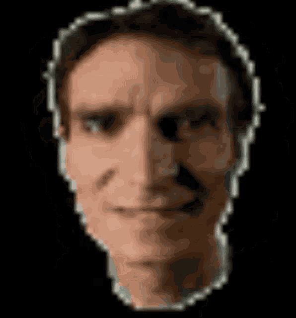 a pixelated image of a man 's face with a serious look on his face .