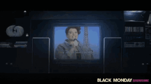 a tv screen shows a woman singing and the words they say