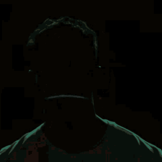 a close up of a man 's face with a headband on