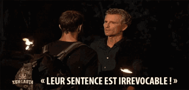 two men are standing next to each other and one of them says leur sentence est irrevocable