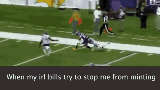 a football player is being tackled by another player on a field with the words when my irl bills try to stop me from minting