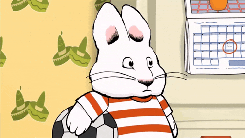 a cartoon of a rabbit holding a soccer ball in front of a calendar