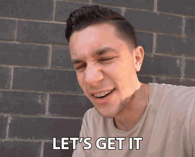 a man says let 's get it while making a funny face